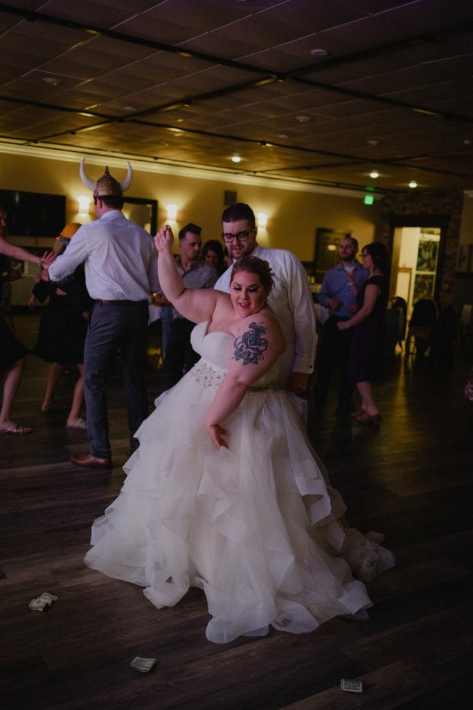 bride dances with wedding guests