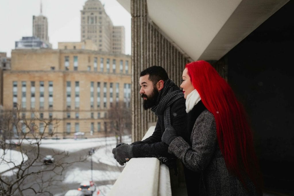 couple looks out at buffalo winter turner ramp